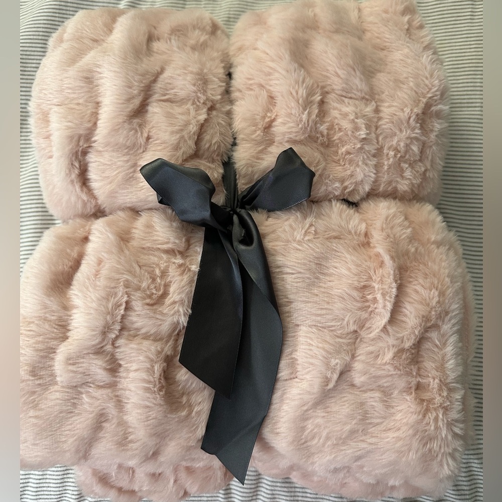 Ruched faux fur throw